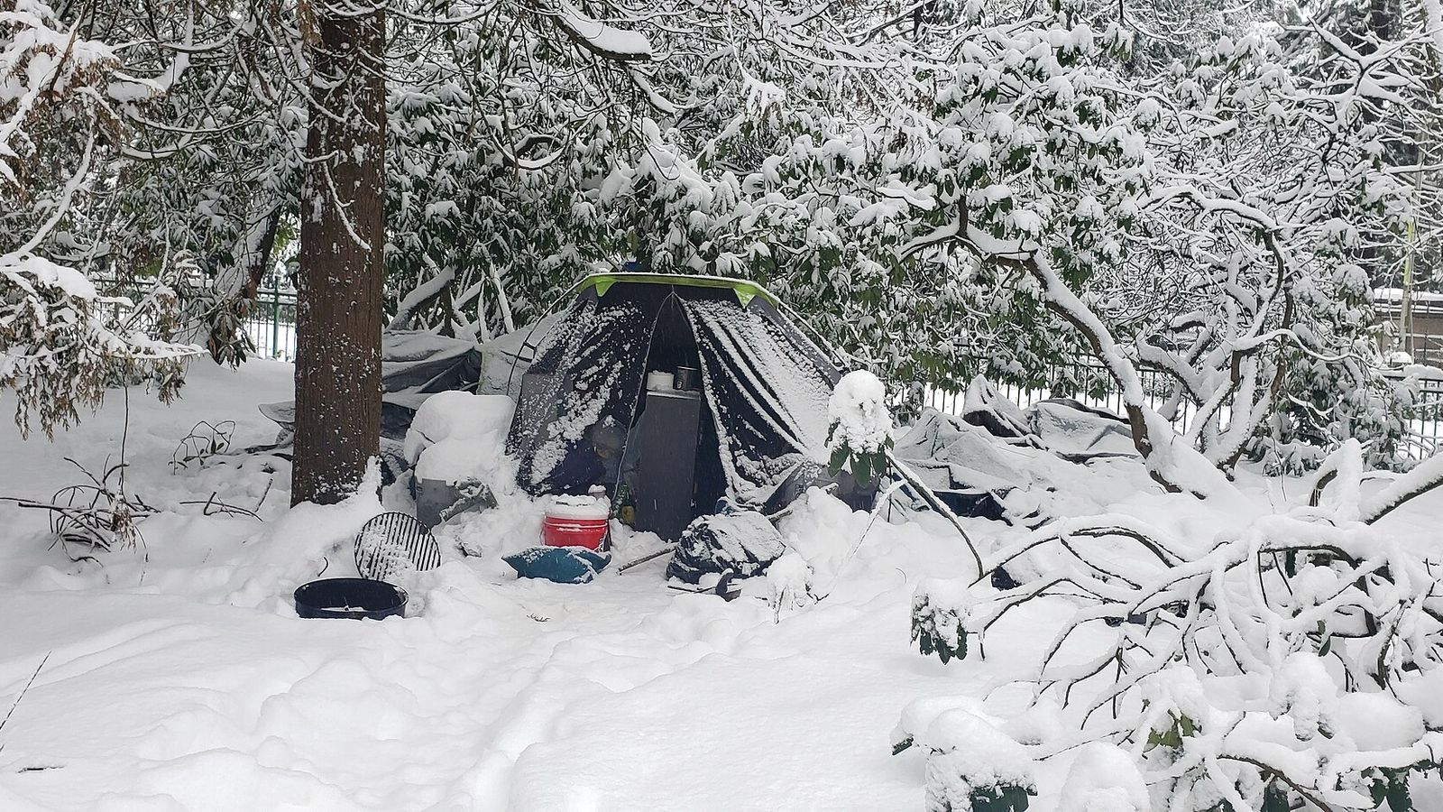 A tent pitched in deep snow